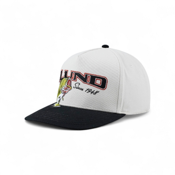 Angled front view of the Lund Big Catch Hat featuring a large jumping fish graphic, Lund logo, and dark bill.