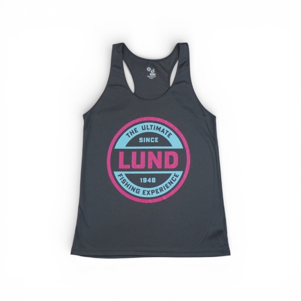 Dark gray women’s racerback tank top featuring a large retro‑style circular Lund graphic in teal, pink, and white with the text “The Ultimate Fishing Experience Since 1948.”