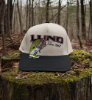 Lund Big Catch Hat on a mossy stump