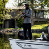 Man wishing on Lund 1800 Adventure wearing Channel hat