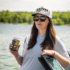 Lund Big Catch Hat on woman in boat