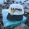 Lund Big Catch Hat photographed atop a tackle box